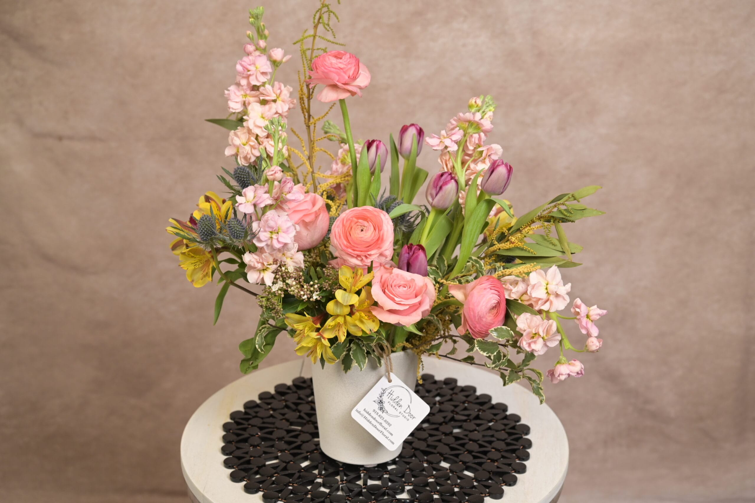 Hand-arranged luxury floral bouquet with seasonal flowers by Hidden Door Floral Studio