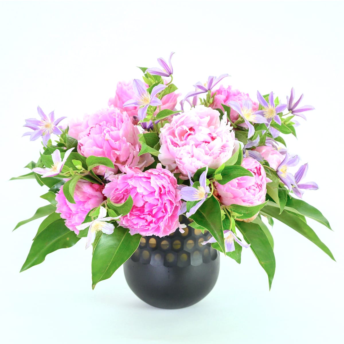 Helen peony and clematis arrangement by Hidden Door Floral Studio Raleigh