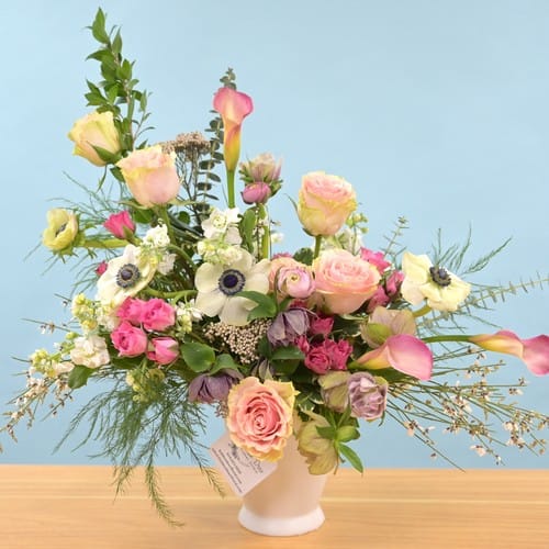 Flower Delivery North Hills - Colorful mixed roses with yellow and pink accents arranged for delivery to the North Hills area of Raleigh