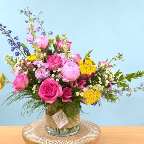 Flower Delivery Glenwood South - Pink and coral garden arrangement with blue delphinium accents delivered to Glenwood South in Raleigh